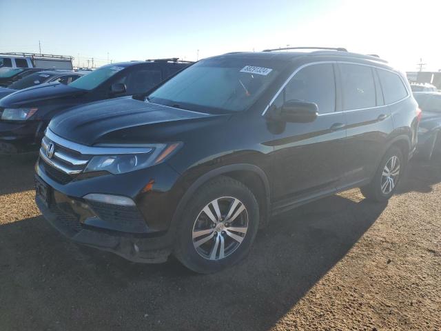 HONDA PILOT EXL 2016 with VIN 5FNYF6H53GB049919 - Photo from auction