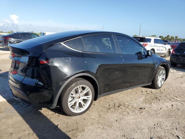 Photo 3 from auction – 2023 TESLA MODEL Y with VIN 7SAYGDEE6PF894725