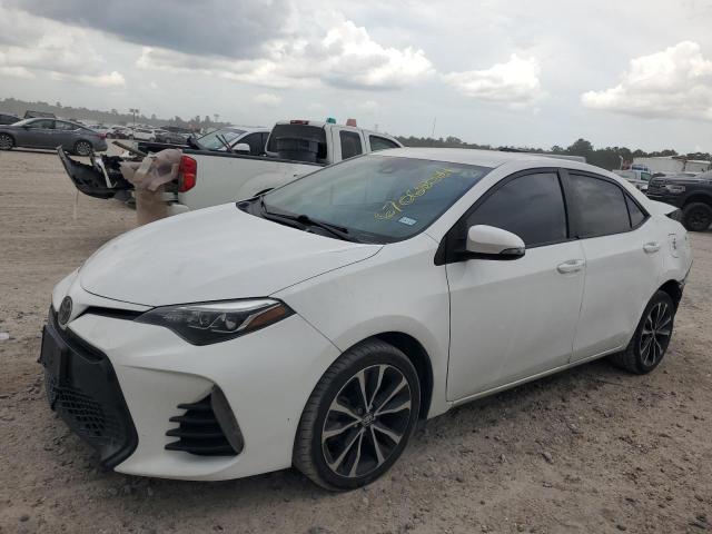 TOYOTA COROLLA L 2017 with VIN 5YFBURHE1HP733631 - Photo from auction