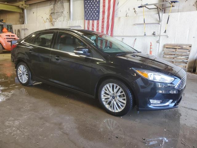 Photo 4 from auction – 2015 FORD FOCUS TITA with VIN 1FADP3J28FL240974