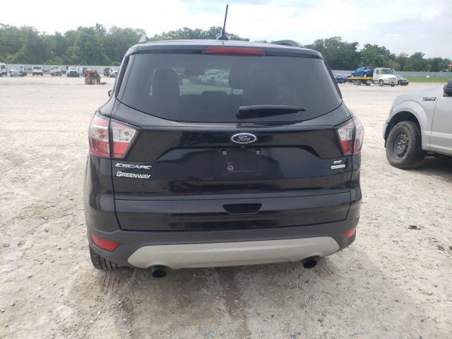 Photo 6 from auction – 2018 FORD ESCAPE SE with VIN 1FMCU0GD7JUA94488