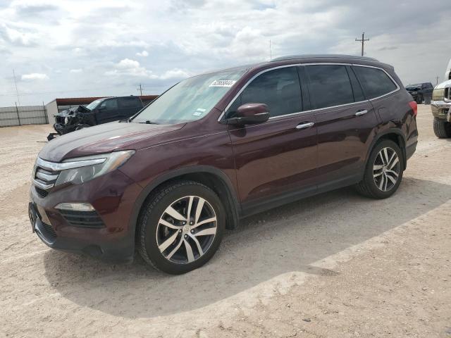 HONDA PILOT TOUR 2016 with VIN 5FNYF5H94GB056150 - Photo from auction