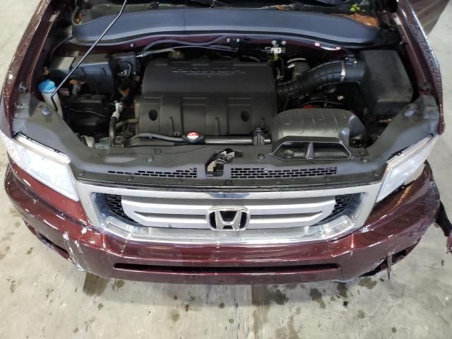 Photo 11 from auction – 2010 HONDA RIDGELINE with VIN 5FPYK1F52AB012246