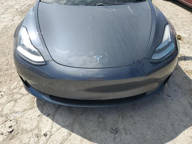 Photo 11 from auction – 2018 TESLA MODEL 3 with VIN 5YJ3E1EA1JF048468