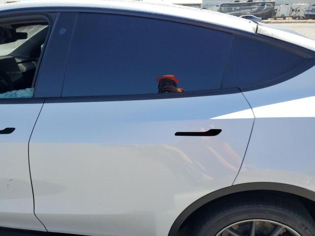 Photo 11 from auction – 2023 TESLA MODEL Y with VIN 7SAYGAEE0PF640183