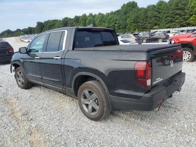 Photo 2 from auction – 2023 HONDA RIDGELINE with VIN 5FPYK3F78PB046732