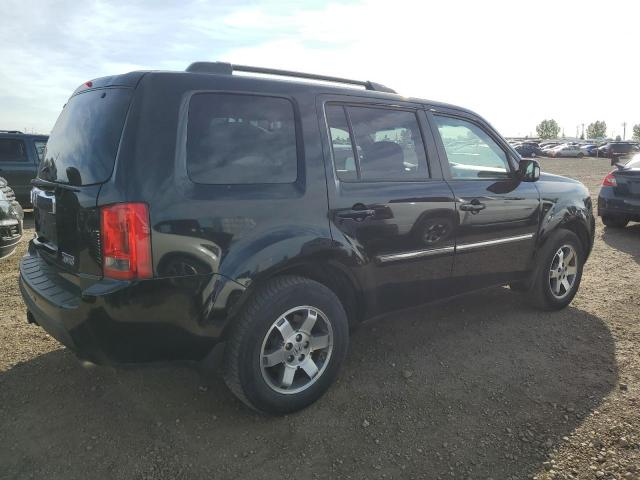 Photo 3 from auction – 2010 HONDA PILOT TOUR with VIN 5FNYF4H93AB502323