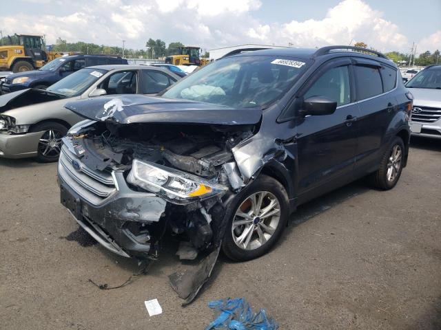 FORD ESCAPE SE 2018 with VIN 1FMCU9GD2JUB78688 - Photo from auction
