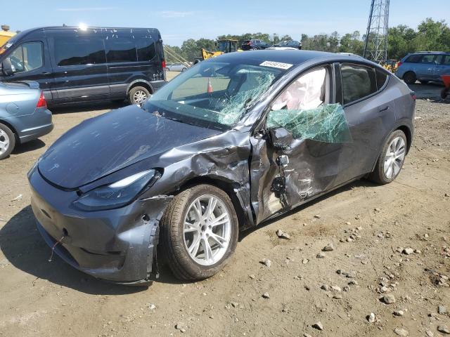 TESLA MODEL Y 2023 with VIN 7SAYGDED6PF930615 - Photo from auction