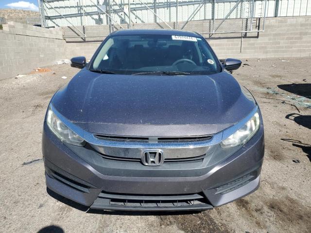 Photo 5 from auction – 2018 HONDA CIVIC EX with VIN 19XFC2F70JE040914