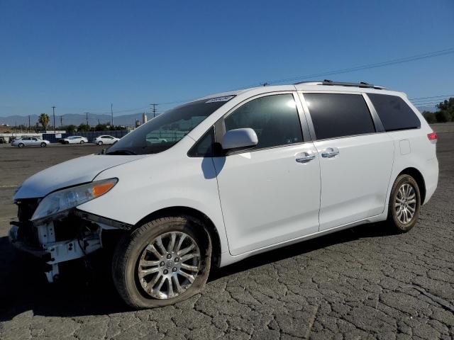 TOYOTA SIENNA XLE 2012 with VIN 5TDYK3DCXCS181113 - Photo from auction