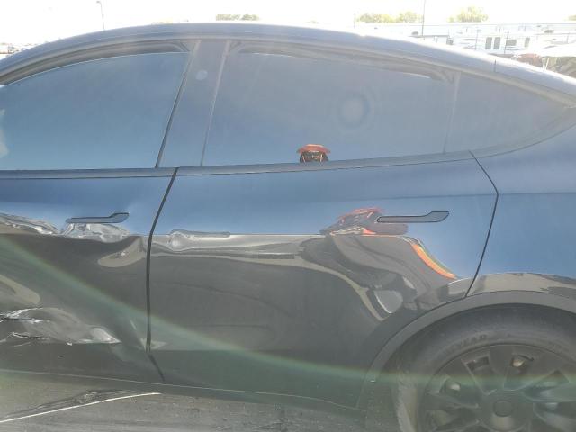 Photo 11 from auction – 2024 TESLA MODEL Y with VIN 7SAYGDED0RF055308