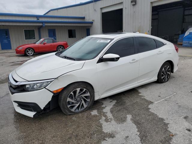 HONDA CIVIC EX 2018 with VIN 19XFC2F7XJE036465 - Photo from auction