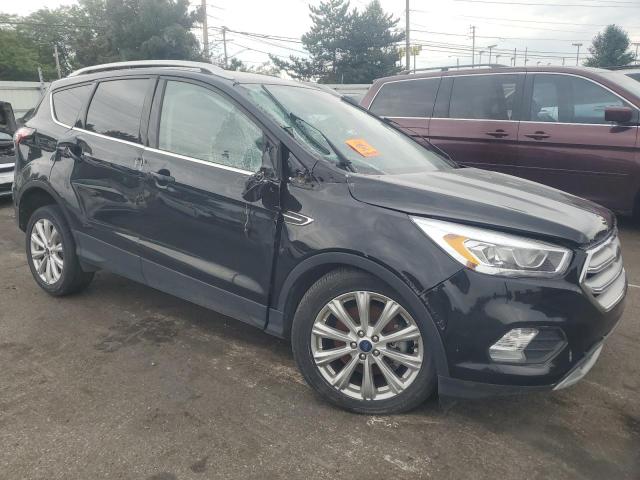 Photo 4 from auction – 2017 FORD ESCAPE TIT with VIN 1FMCU0J99HUD74721