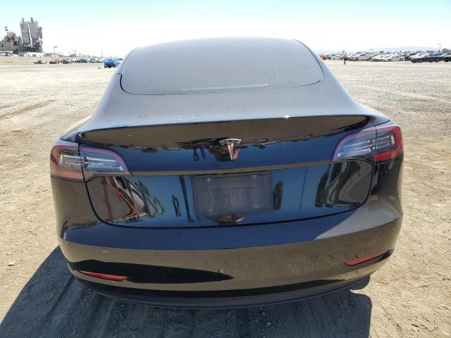 Снимка 6 от търг – 2021 TESLA MODEL 3 с VIN 5YJ3E1EA0MF005485