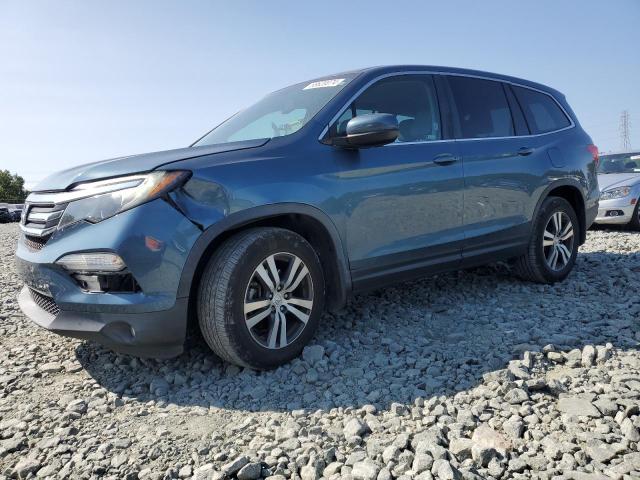 HONDA PILOT EXL 2018 with VIN 5FNYF5H59JB023360 - Photo from auction