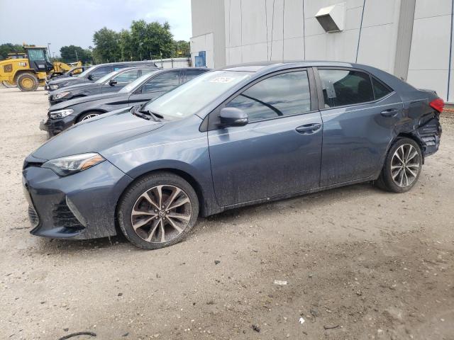TOYOTA COROLLA L 2017 with VIN 5YFBURHE4HP651747 - Photo from auction