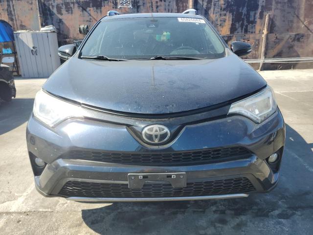 Photo 5 from auction – 2017 TOYOTA RAV4 SE with VIN JTMNFREV3HJ712912