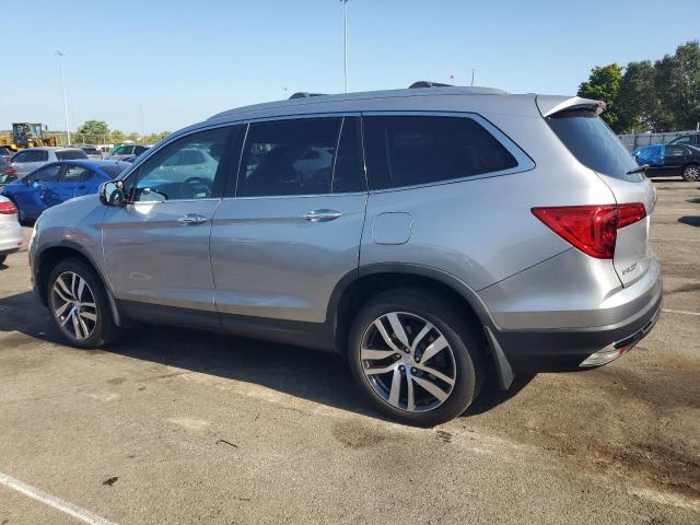 Photo 2 from auction – 2018 HONDA PILOT TOUR with VIN 5FNYF6H9XJB038071