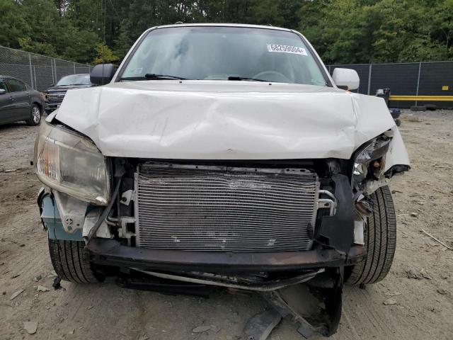 Photo 5 from auction – 2010 MERCURY MARINER PR with VIN 4M2CN9HG2AKJ19351