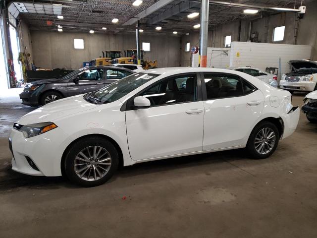 TOYOTA COROLLA L 2014 with VIN 5YFBURHE9EP039104 - Photo from auction