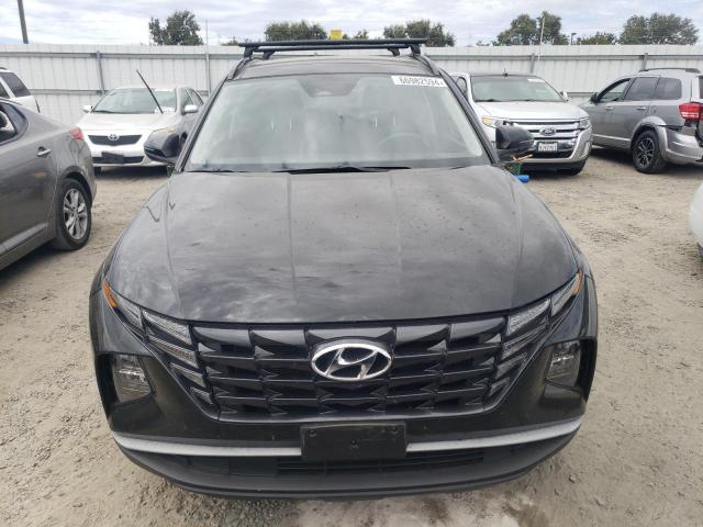Photo 5 from auction – 2022 HYUNDAI TUCSON SEL with VIN KM8JFCA19NU053500