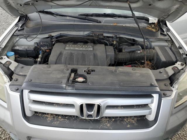 Photo 12 from auction – 2006 HONDA PILOT EX with VIN 2HKYF18586H552235