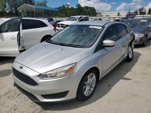 FORD FOCUS SE 2016 with VIN 1FADP3F21GL371478 - Photo from auction