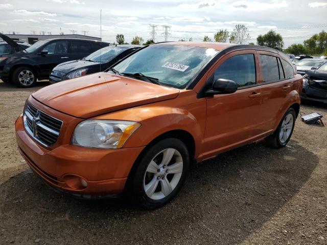 DODGE CALIBER MA 2011 with VIN 1B3CB3HAXBD108046 - Photo from auction