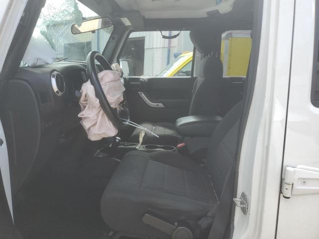 Photo 7 from auction – 2011 JEEP WRANGLER U with VIN 1J4BA6H18BL633749