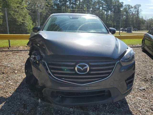 Photo 5 from auction – 2016 MAZDA CX-5 GT with VIN JM3KE2DYXG0886030