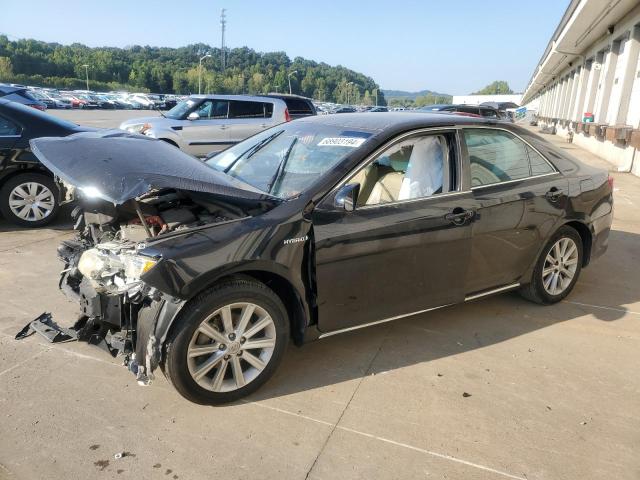 TOYOTA CAMRY HYBR 2014 with VIN 4T1BD1FK3EU117983 - Photo from auction