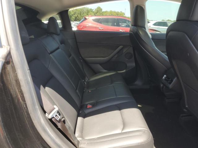 Photo 10 from auction – 2021 TESLA MODEL Y with VIN 5YJYGDEE9MF091237
