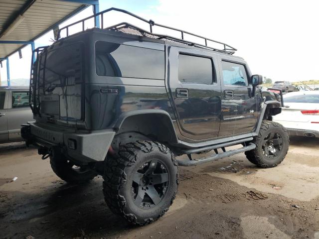 Photo 3 from auction – 2006 HUMMER H2 with VIN 5GRGN23U16H105309
