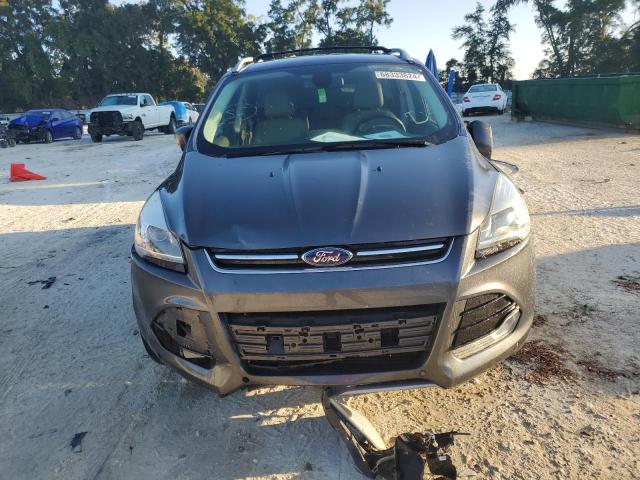 Photo 5 from auction – 2015 FORD ESCAPE TIT with VIN 1FMCU0J94FUB56683