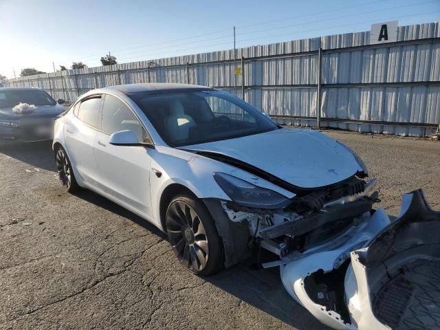 Photo 4 from auction – 2021 TESLA MODEL 3 with VIN 5YJ3E1EC9MF875334
