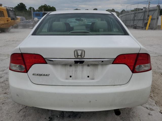 Photo 6 from auction – 2011 HONDA CIVIC LX with VIN 19XFA1F59BE021052