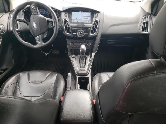 Photo 8 from auction – 2016 FORD FOCUS TITA with VIN 1FADP3J29GL248762