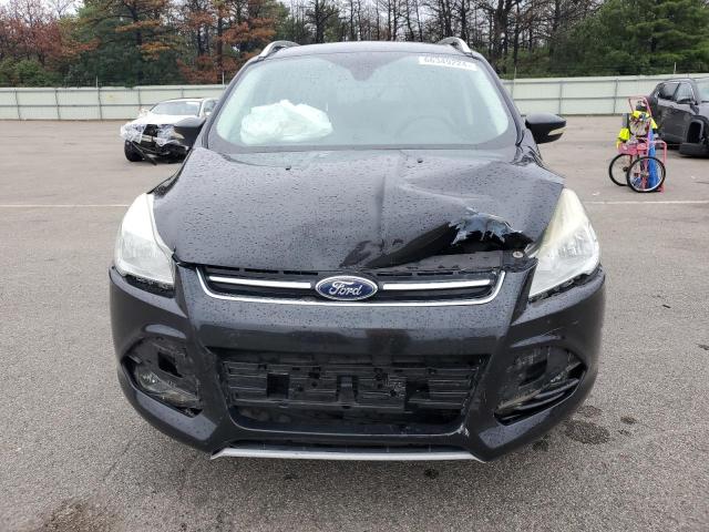 Photo 5 from auction – 2014 FORD ESCAPE TIT with VIN 1FMCU0J97EUE57656