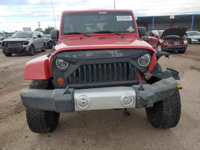 Photo 5 from auction – 2011 JEEP WRANGLER U with VIN 1J4BA5H14BL630180