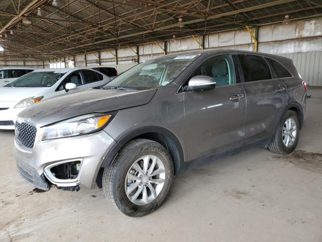 KIA SORENTO LX 2016 with VIN 5XYPG4A32GG148648 - Photo from auction
