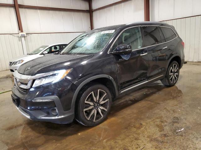 HONDA PILOT TOUR 2020 with VIN 5FNYF6H64LB063797 - Photo from auction