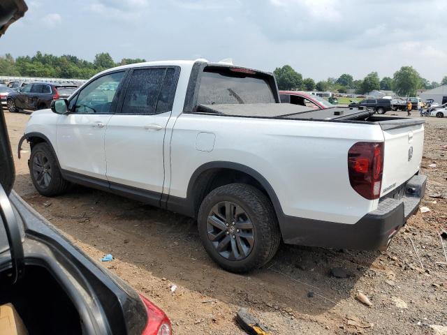 Photo 2 from auction – 2023 HONDA RIDGELINE with VIN 5FPYK3F19PB024167