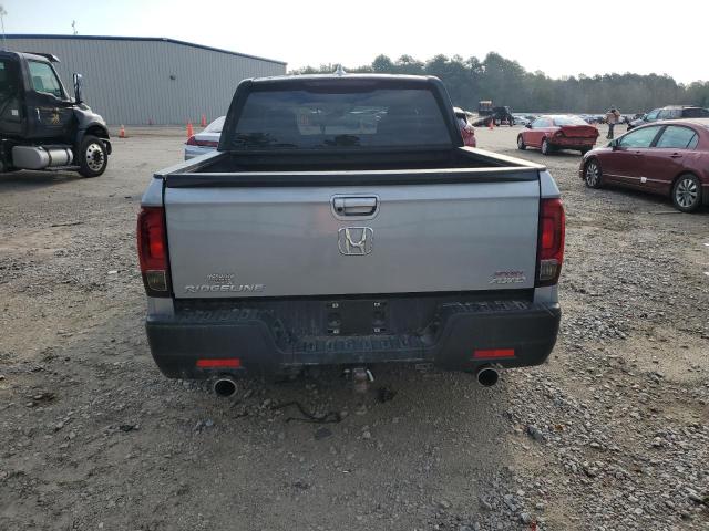 Photo 6 from auction – 2023 HONDA RIDGELINE with VIN 5FPYK3F18PB049352