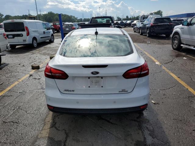 Photo 6 from auction – 2015 FORD FOCUS SE with VIN 1FADP3F20FL254070