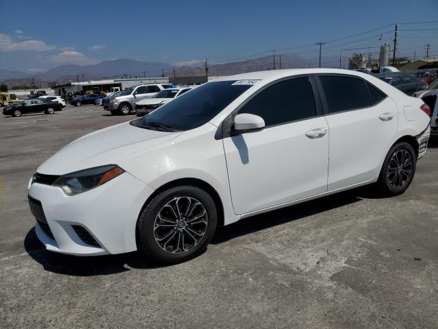 TOYOTA COROLLA L 2015 with VIN 2T1BURHE0FC385706 - Photo from auction