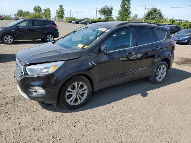 FORD ESCAPE SE 2018 with VIN 1FMCU9GD5JUC81006 - Photo from auction
