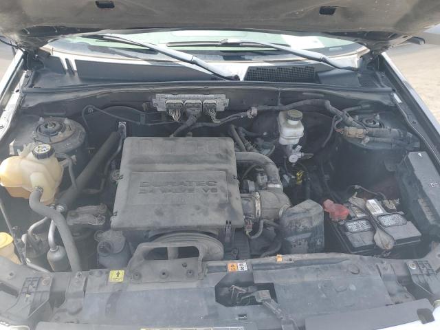Photo 12 from auction – 2009 FORD ESCAPE LIM with VIN 1FMCU04G29KB40458