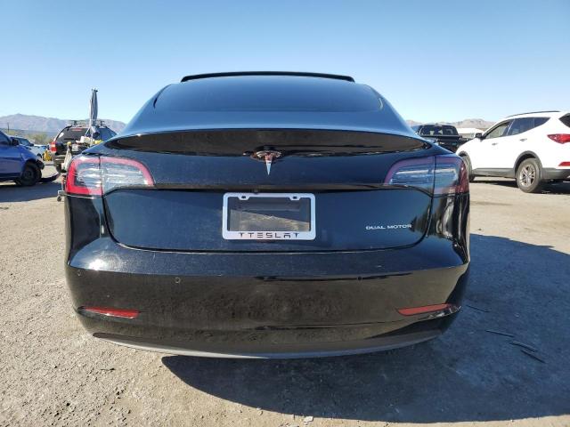 Photo 6 from auction – 2021 TESLA MODEL 3 with VIN 5YJ3E1EB6MF052044