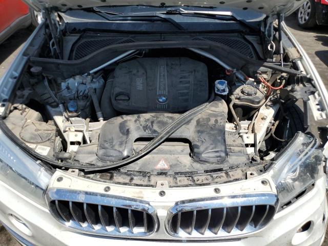 Photo 11 from auction – 2014 BMW X5 XDRIVE3 with VIN 5UXKS4C50E0J93919